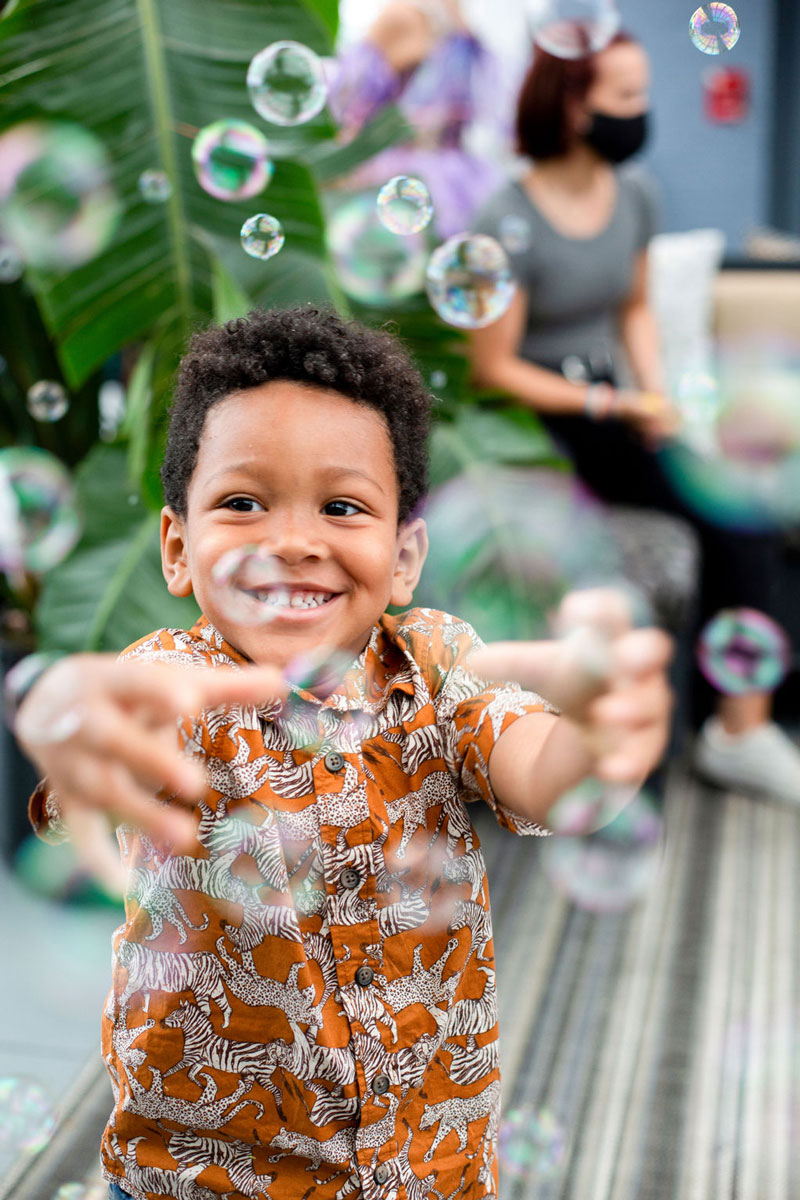 child with bubbles